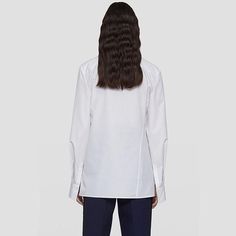 Discover Elegance and Comfort Step into the world of refined fashion with our Asymmetric Cotton Blouse, a perfect blend of style and comfort. Designed for the modern woman, this blouse is a versatile piece that elevates your wardrobe with its understated elegance. Whether you're heading to the office or enjoying a casual day out, this blouse is your go-to choice for a chic, put-together look. Product Features Our blouse boasts a unique asymmetric lapel and a side single-breasted design that adds a contemporary twist to the classic blouse. The solid color pattern, available in timeless white and black, ensures it pairs effortlessly with any outfit. Crafted from a blend of high-quality cotton and polyester, the blouse offers both durability and comfort. Its loose fit design provides a relaxe Luxury Button, Refined Fashion, Classic Blouses, Unique Blouse, Clothing Catalog, Blouse For Women, Midi Skirts, Stylish Shirt, Loose Blouse