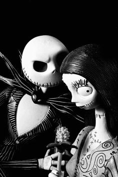 two dolls dressed as jack and sally from the nightmare