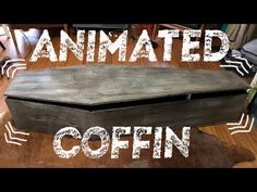 an old wooden box sitting on top of a hard wood floor with the words, animated coffin