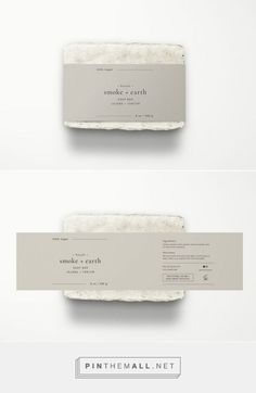 three different types of business cards and envelopes with the same logo on them, all in white