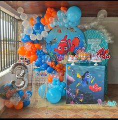 an under the sea birthday party with balloons and decorations