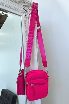 A basic must have! The Rubab cross body offers 3 pockets, silver hardware and an adjustable webbed shoulder strap with the "THATSSOFETCH" logo printed through out. Wear her on repeat with your day to day fits! Pink Cross Body Bag, Day Fits, Day To Day, To Day, On Repeat, Silver Hardware, Sale Items, Cross Body, Hot Pink