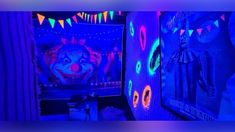 a clown themed room with neon lights and decorations