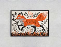 an orange and black fox on a white wall