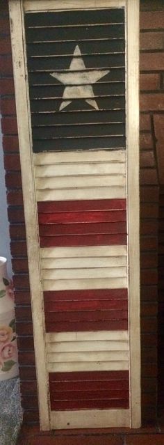 an old door painted with the american flag