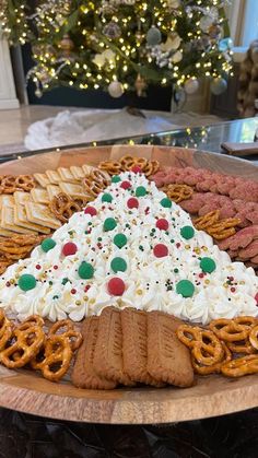 a large platter filled with pretzels and cookies