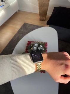 a person wearing an apple watch on their wrist