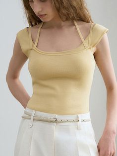 This is a trendy and feminine top by RENEJ that is made out of high quality and sturdy material. With distinctive mood of the design and comfortable wear, you can style it for your casual daily outfit.- Clean square neckline- Soft and light summer knit fabric- Unique and feminine mood Elegant Spring Tank Knit Top, Elegant Crew Neck Tank Top For Summer, Beige Stretch Sleeveless Blouse, Stretch Beige Sleeveless Blouse, Fitted Knit Tank Top For Spring, Chic Fitted Tank Knit Top, Spring Sleeveless Fitted Top, Fitted Summer Knit Tank Top, Fitted Sleeveless Top For Spring