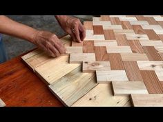 a person is working on some wood