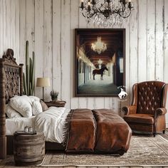 a bedroom with a horse painting on the wall