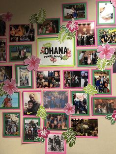 a group of people standing in front of a wall with pictures on it and the words ohana