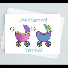 congratulations card with two colorful baby carriages on the front, and text that reads congratulations time's two