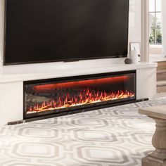 a large television mounted above a fireplace in a living room with white walls and flooring