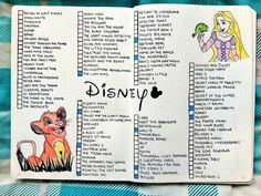 an open notebook with disney characters on it