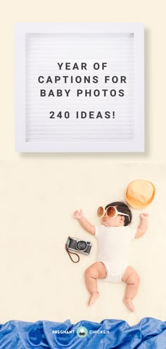 a baby laying on top of a bed next to a sign that says year of captions for baby photos