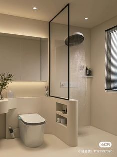 a bathroom with a toilet, sink and shower head in it's center area