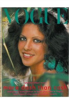 a magazine cover with a woman smiling and butterflies on her hair in the foreground