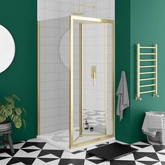 a bathroom with green walls and black and white flooring, including a walk in shower