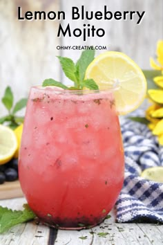 lemon blueberry mojito with mint garnish on the rim