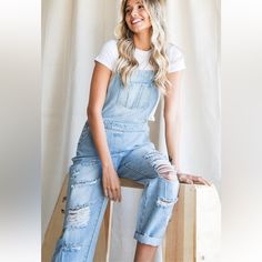 New In Trending Distressed Denim Overalls With Pockets Loose Fit 100% Cotton Hand Wash/Delicate Cycle. Hang Dry S M L Xl Medium Wash Denim Jumpsuit, Ripped Denim Blue Jumpsuit, Casual Denim Blue Jumpsuit With Frayed Hem, Spring Distressed Overall Jeans, Casual Light Wash Overall Jeans, Spring Ripped Jeans Overall, Casual Denim Jumpsuit With Frayed Hem In Medium Wash, Casual Medium Wash Denim Jumpsuit With Frayed Hem, Denim Blue Ripped Overall Jeans