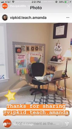 an image of a room with a computer on the desk and pictures on the wall