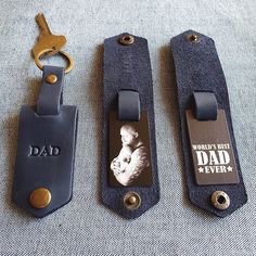 three personalized luggage tags with a keychain attached to them, one for dad and the other for daughter