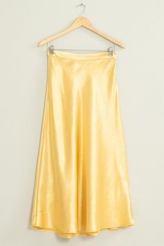 Satin gold shimmering midi skirt. NOTE: If your size is not available, please register your email in EMAIL ME WHEN AVAILABLE link. Gold Lined Skirt For Night Out, Chic Yellow Evening Skirt, Chic Gold Lined Skirt Bottoms, Chic Gold Bottoms With Lined Skirt, Yellow Evening Skirt For Spring, Chic Gold Skirt, Yellow Long Skirt For Evening, Chic Gold Flared Skirt, Glamorous Long Gold Skirt