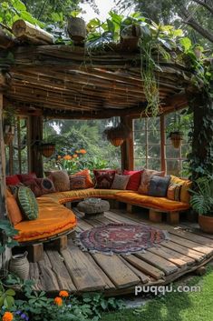 an outdoor seating area with lots of plants