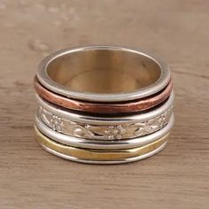 Sterling Silver Spinner Ring Crafted in India - Exciting Garden | NOVICA Unique Silver Rings, Womens Silver Jewelry, Fall Rings, Single Stone Ring, Silver Rings Simple, Unique Fall, Silver Spinner Rings, Silver Wedding Rings, Ring Crafts