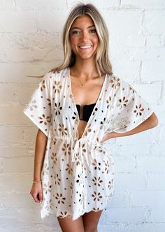 Elevate your beach look with this ivory front tie bathing suit cover up, offering effortless style and versatile comfort for poolside lounging or seaside strolls. 100% Cotton Hand Wash Cold Line Dry Front Tie Meet Brae! Height: 5’7” Hips: 35” Bust:34” Waist: 25” Wearing Size: Small Bathing Suit Cover, Denim Sweater, Bathing Suit Covers, Bathing Suit Cover Up, Sweater Crop, Vintage Havana, Sweater Gift, Crop Top Sweater, Romper Dress