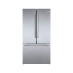 a silver refrigerator freezer sitting on top of a white wall