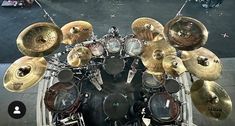 an overhead view of a drum set with lots of cymbals on the drums