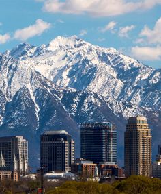 the snow covered mountains are in the distance