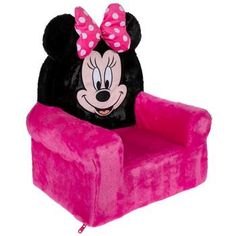 a minnie mouse chair that is pink and has a polka dot bow on it's head