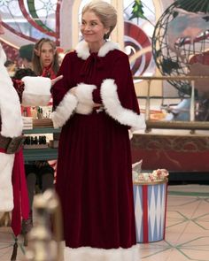 The Santa Clauses 2022 Mrs Claus Costume Mrs Claus Costume, Elizabeth Mitchell, Santa Claus Costume, Santa Costume, Battle Jacket, White Apron, Velvet Hat, Red Velvet Dress, Christmas Events