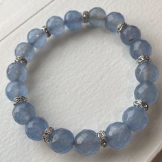 Round Faceted Light Blue Natural Jade Stretch Bracelet Rhinestone Spacers  Blue Jade is known for calming the mind Blue Jade, Natural Jade, Jade Beads, Stretch Bracelet, The Mind, Stretch Bracelets, Beaded Bracelet, Jade, Beauty Book