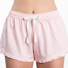 "Our new pajama shorts are the perfect addition to any girl's sleep wardrobe. Finished with a darling half inch ruffle, they have just enough flair and sass. Pair with your favorite sleep shirt or one of our sleep tees. Made with 100% cotton, these flirty shorts are lightweight, cool and comfy. Add a monogram for a more personalized gift. You'll want these in every color! Available in three sizes: small, medium and large. Small (US size 0-4): 25\"-28\" waist, 2\" inseam Medium (US size 6-8): 28\ Spa Lounge, Shorts Pajamas, Pink Pajamas, Sleep Shorts, Ruffle Shorts, Pink Outfits