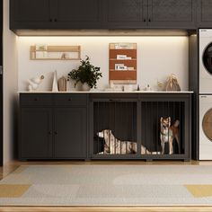 two dogs in their kennels next to the washer and dryer machine