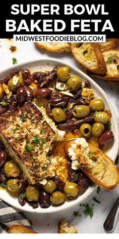 a bowl filled with olives and bread next to the words super bowl baked feta