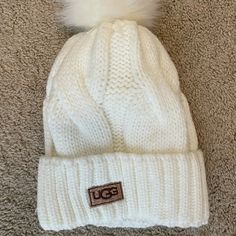 White Ugg Winter Hat - Never Worn. Casual White Hats For Cold Weather, Casual White Hat For Cold Weather, Trendy Warm White Hat, Trendy White Warm Hats, Casual White Hat For Fall, White Fall Hat, One Size Fits Most, Cozy White Hat One Size, Trendy White Winter Hat, Trendy White Beanie One Size