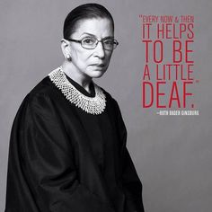 a black and white photo of a woman wearing glasses with a quote on the background