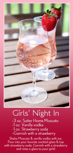 a poster for girls'night in with two glasses of wine and strawberries on the table