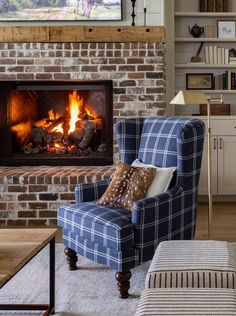 a living room with a fire place in the fireplace