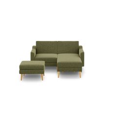 a green couch and ottoman sitting next to each other