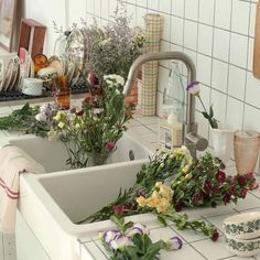 flowers are laying on the kitchen counter top