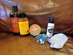 the contents of a leather sofa including toothbrushes, lotion and other items