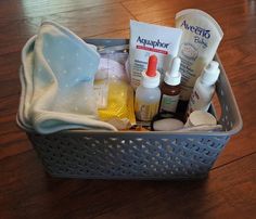 a basket filled with personal care items on top of a wooden floor