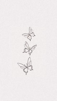 three butterflies flying in the air on a white background with black lines and one is drawn by hand