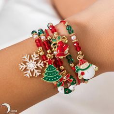 Get into the Christmas spirit with our Christmas Bracelet Set! This exclusive set includes 5 beautifully crafted bracelets, each adorned with festive Christmas-themed designs. Featuring Christmas Bells, Snowman, Candy Canes, and more, these bracelets are perfect for adding a touch of holiday cheer to your seasonal attire. Key Features: * Joyful and Fun: Made from durable iron alloy.  Ideal for Christmas parties, holiday celebrations, or adding a festive touch to your everyday look ️  * Perfect G Jewelry For Christmas, Snowflake Tree, Daily Wear Jewellery, Set Bracelet, Boys Jewelry, Packing Jewelry, Christmas Set, Christmas Bracelet, Christmas Charms