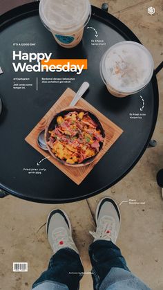 a person standing in front of a table with food on it and the words happy wednesday